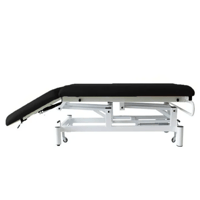 Kinefis Quality two-section hydraulic treatment table (upholstered in black): With retractable wheels, reclining backrest with gas piston, highly stable white frame - Last unit in stock Kinefis Quality two-section hydraulic treatment table (upholstered in black): With retractable wheels, reclining backrest with gas piston, highly stable white frame - Last unit in stock