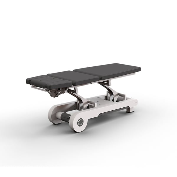 Naggura N'Run5 EVO high-end electric stretcher: three sections, a motor to control height, and a side button to adjust Trendelenburg and lumbar flexion positions.