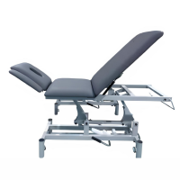 Kinefis Comfort 5-section hydraulic stretcher: with adjustable headrest, face opening, and adjustable armrests Kinefis Comfort 5-section hydraulic stretcher: with adjustable headrest, face opening, and adjustable armrests